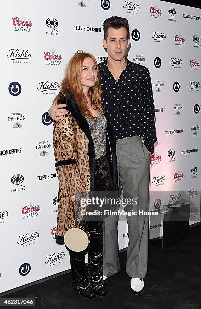 Josephine de La Baume and Mark Ronson arrive at Mark's album launch party at BBC Television Centre on January 23, 2015 in London, England.