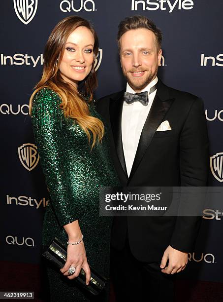 Actress Olivia Wilde and Editor of InStyle Ariel Foxman attend the 2014 InStyle And Warner Bros. 71st Annual Golden Globe Awards Post-Party at The...