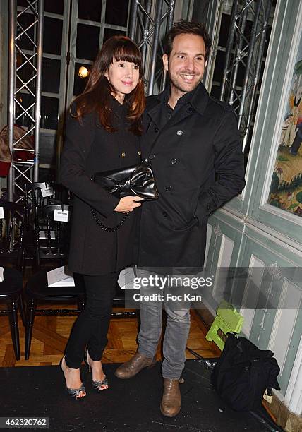 Delphine McCarty and Christophe Michalak attend The Alexis Mabille show as part of Paris Fashion Week Haute-Couture Spring/Summer 2015 on January 26,...