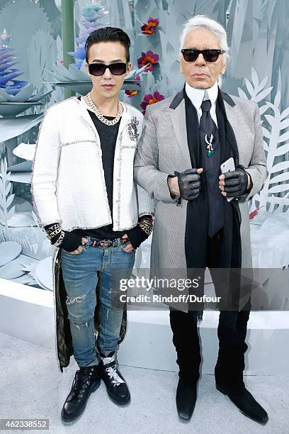 Dragon and Fashion Designer Karl Lagerfeld pose after the Chanel show as part of Paris Fashion Week Haute Couture Spring/Summer 2015 on January 27,...