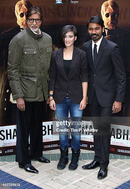 Actors Amitabh Bachchan, Akshara Haasan and Dhanush attend a photocall for "Shamitabh" at St James Court Hotel on January 27, 2015 in London, England.