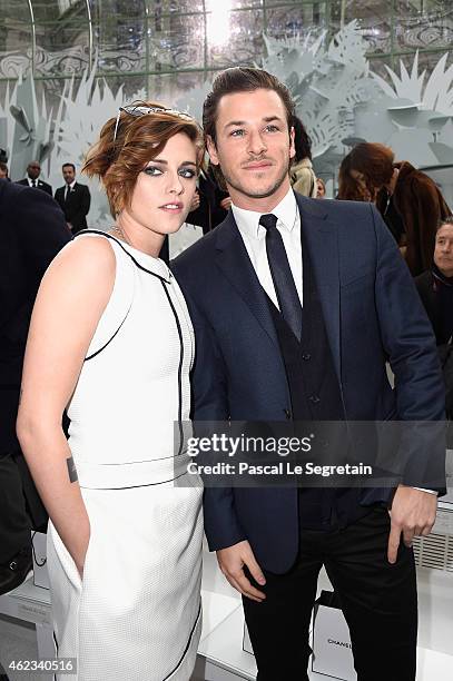Kristen Stewart and Gaspard Ulliel attend the Chanel show as part of Paris Fashion Week Haute Couture Spring/Summer 2015 on January 27, 2015 in...