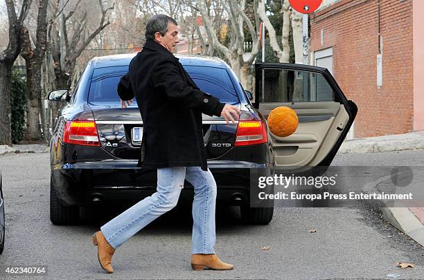 Antonio Banderas gets out of car to return a ball to the children in a school on January 27, 2015 in Madrid, Spain.