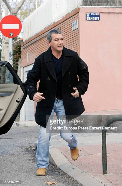 Antonio Banderas gets out of car to return a ball to the children in a school on January 27, 2015 in Madrid, Spain.