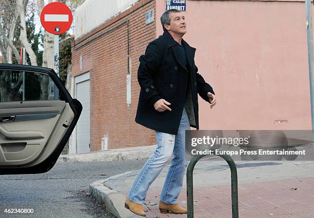 Antonio Banderas gets out of car to return a ball to the children in a school on January 27, 2015 in Madrid, Spain.