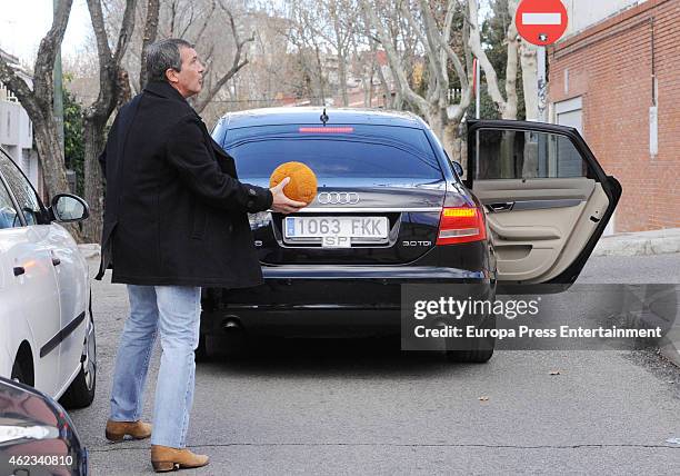 Antonio Banderas gets out of car to return a ball to the children in a school on January 27, 2015 in Madrid, Spain.