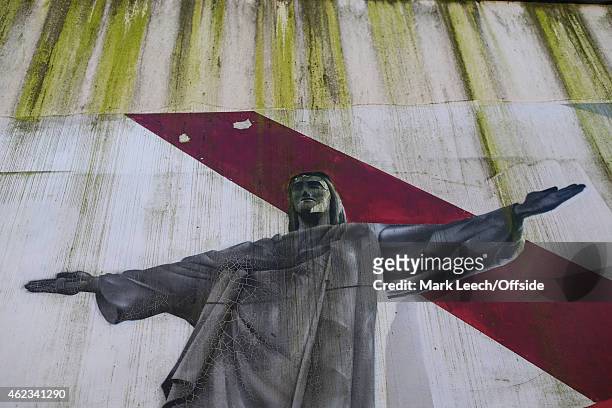 Mural of Christ the redeemer on the wall of the footbridge adjacent to St Mary's stadium during the FA Cup Fourth Round match between Southampton and...