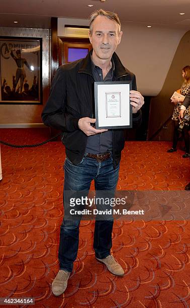 Ivo van Hove with the Best Director Award for 'A View From The Bridge' at the 2015 Critics' Circle Theatre Awards at The Prince of Wales Theatre on...