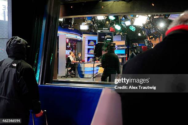 Pedestrians gather to see the cast of "Good Morning America" in Times Square on January 27, 2015 in New York City. New York, and much of the...