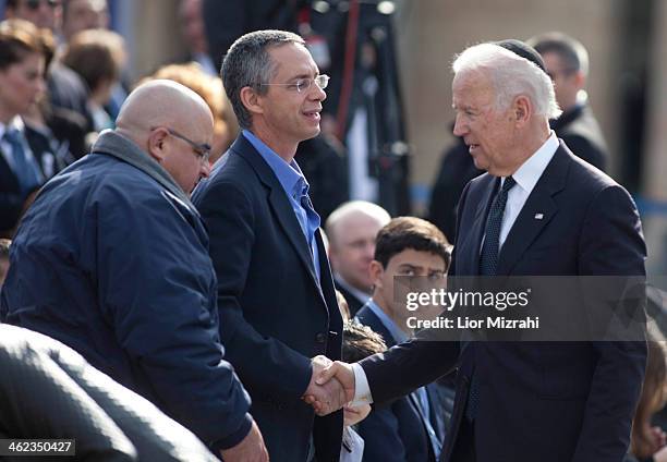 Vice President Joe Biden shakes hands with Gilad Sharon and Omri Sharon the sons of Ariel Sharon during a state memorial service for Israel's former...