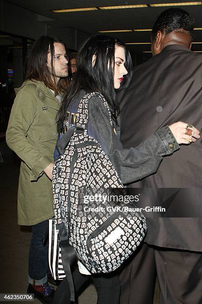 Frances Cobain and Isaiah Silva seen at LAX on January 26, 2015 in Los Angeles, California.