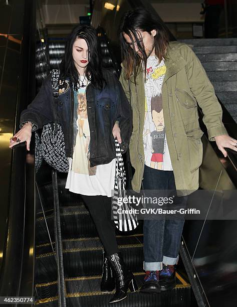 Frances Cobain and Isaiah Silva seen at LAX on January 26, 2015 in Los Angeles, California.