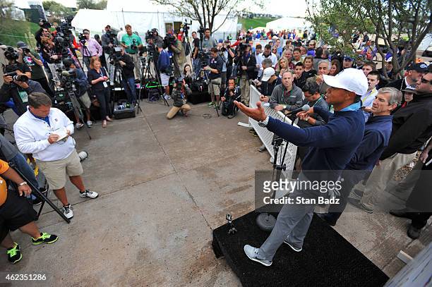 Tiger Woods chats with the media during a press conference at the Waste Management Phoenix Open, at TPC Scottsdale on January 27, 2015 in Scottsdale,...