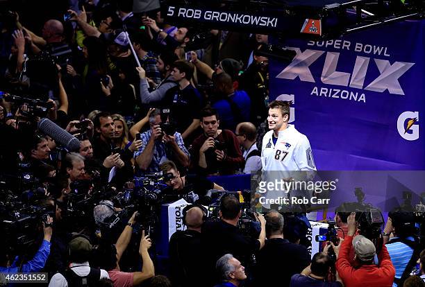 Rob Gronkowski of the New England Patriots addresses the media at Super Bowl XLIX Media Day Fueled by Gatorade inside U.S. Airways Center on January...
