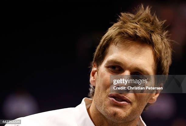 Tom Brady of the New England Patriots addresses the media at Super Bowl XLIX Media Day Fueled by Gatorade inside U.S. Airways Center on January 27,...