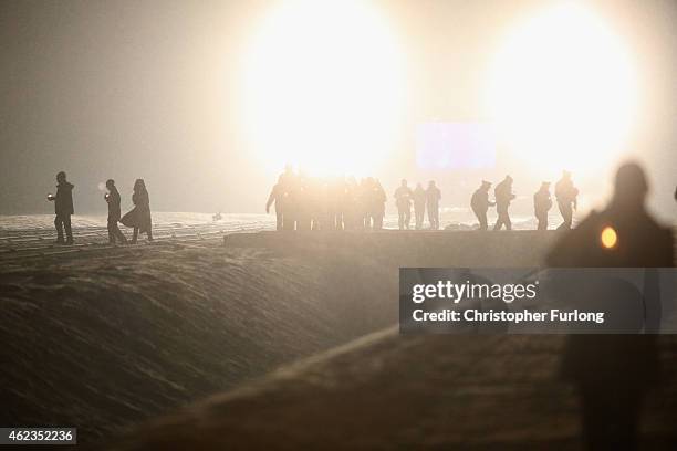 Survivors and families make their way to lay candles at the Birkenau Memorial during the commemoration of the 70th anniversary of the liberation of...