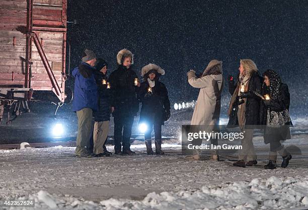 Auschwitz survivors and families visit the Birkenau Memorial carrying candles on January 27, 2015 in Oswiecim, Poland. International heads of state,...
