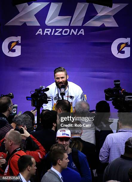 Julian Edelman of the New England Patriots addresses the media at Super Bowl XLIX Media Day Fueled by Gatorade inside U.S. Airways Center on January...