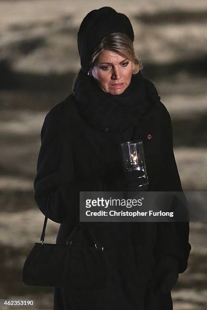 Queen Maxima of The Netherlands lays a candle at the Birkenau Memorial during the commemoration of the 70th anniversary of the liberation of...