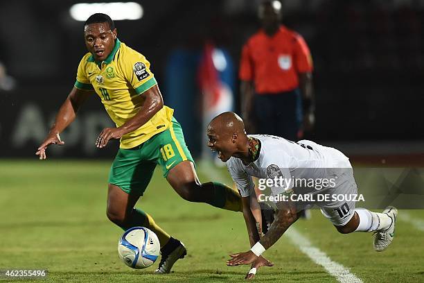 South Africa's midfielder Thuso Phala challenges Ghana's midfielder Andre Ayew during the 2015 African Cup of Nations group C football match between...