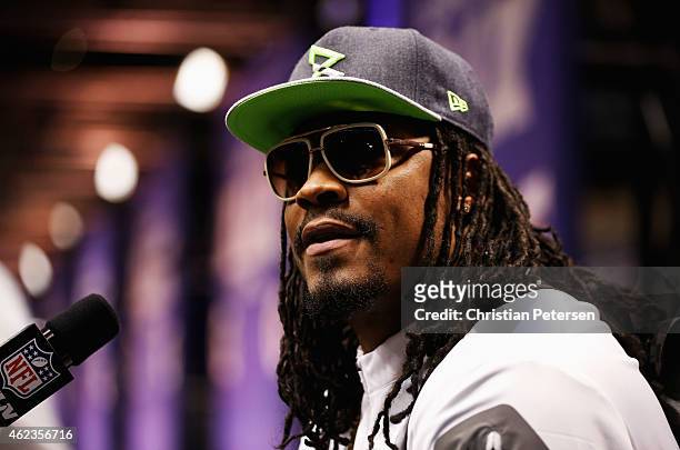 Marshawn Lynch of the Seattle Seahawks addresses the media at Super Bowl XLIX Media Day Fueled by Gatorade inside U.S. Airways Center on January 27,...