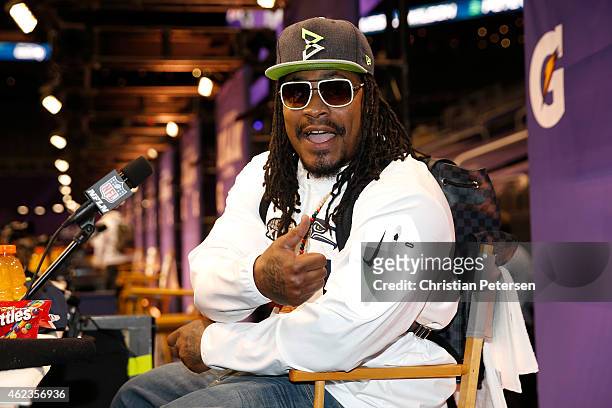 Marshawn Lynch of the Seattle Seahawks addresses the media at Super Bowl XLIX Media Day Fueled by Gatorade inside U.S. Airways Center on January 27,...