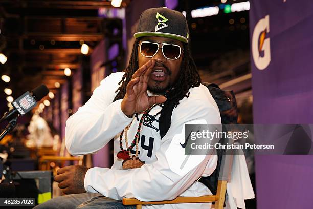 Marshawn Lynch of the Seattle Seahawks addresses the media at Super Bowl XLIX Media Day Fueled by Gatorade inside U.S. Airways Center on January 27,...