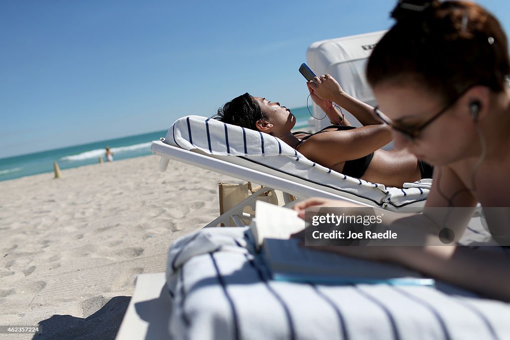 Stranded Travelers Take Refuge On Miami's Beaches