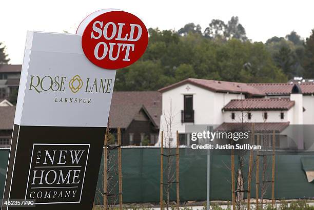 Sold out sign is posted in front of the Rose Lane housing development on January 27, 2015 in Larkspur, California. According to a Commerce Department...