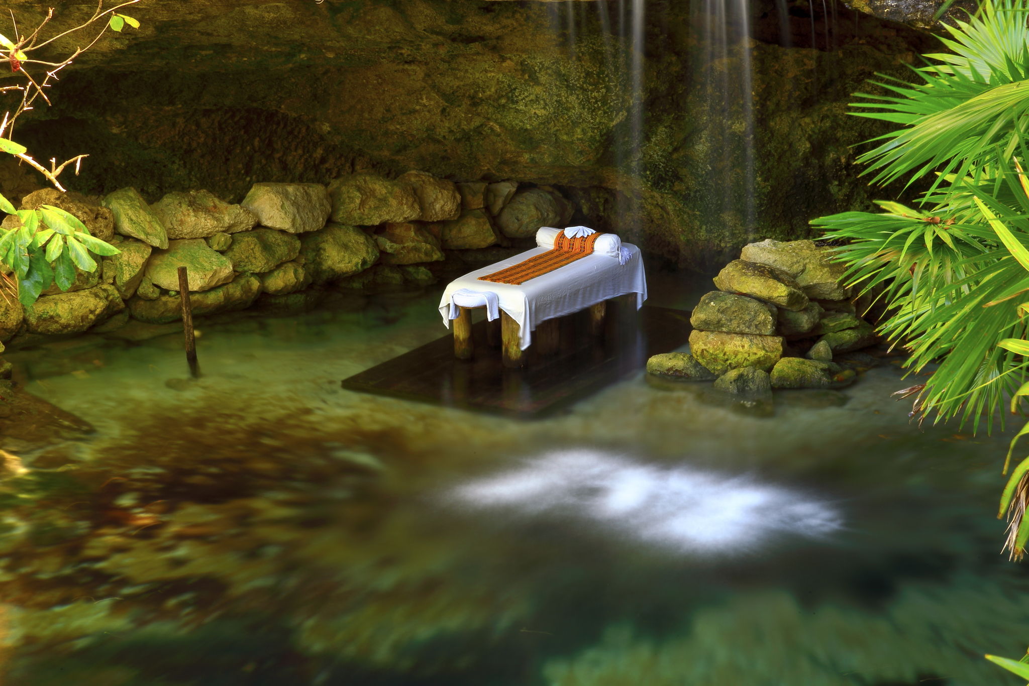 Getting away Relax - massage table and waterfall spa lake Getting away Relax - massage table and waterfall spa lake