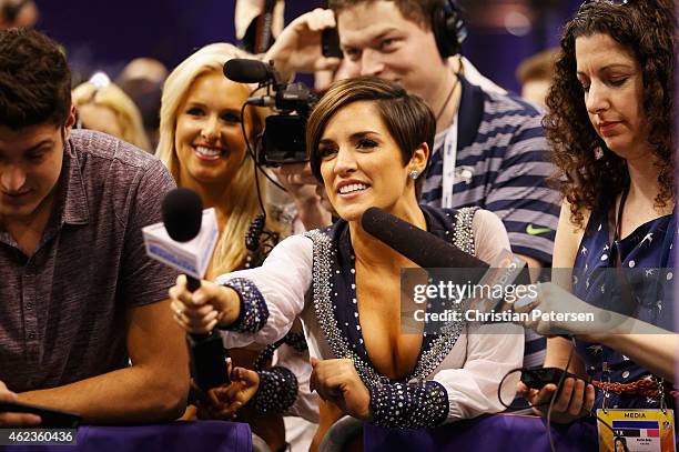 Media member dressed as a cheerleader asks a question at Super Bowl XLIX Media Day Fueled by Gatorade inside U.S. Airways Center on January 27, 2015...