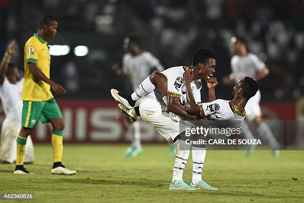 Ghana's defenders John Boye and Harrison Afful celebrate after winning the 2015 African Cup of Nations group C football match between South Africa...