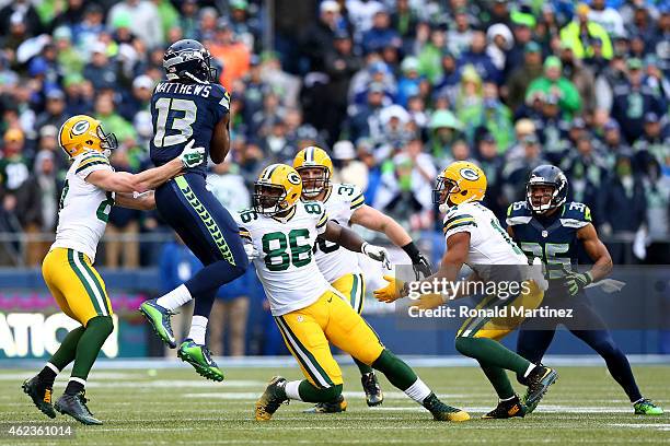 Chris Matthews of the Seattle Seahawks recovers an onside kick against the Green Bay Packers during the 2015 NFC Championship game at CenturyLink...