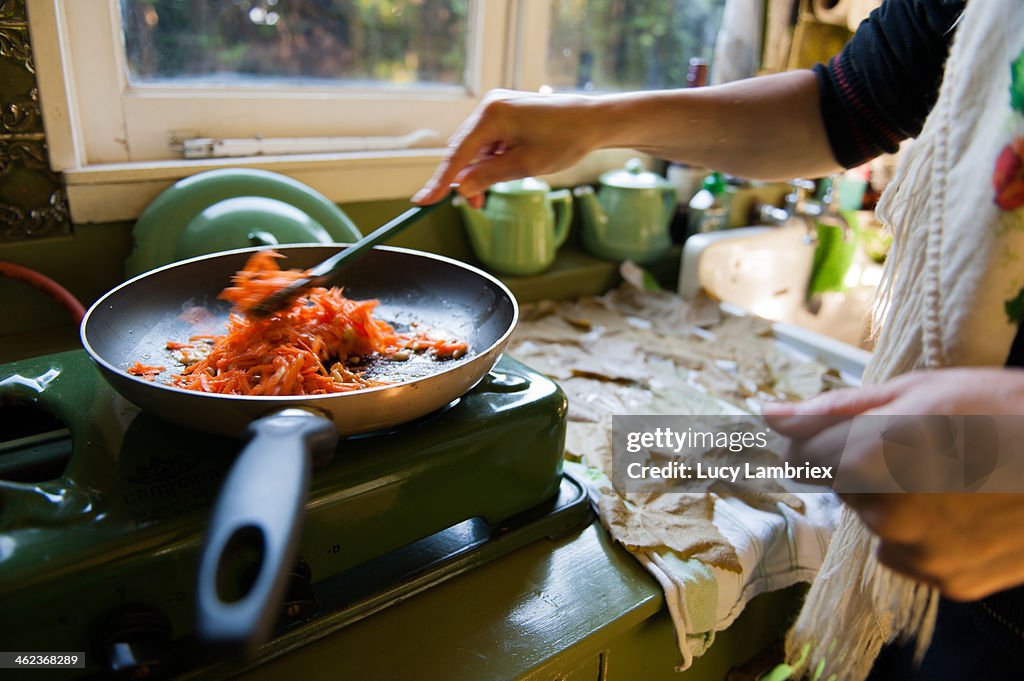 Carrots and rice in a pan for dolmas