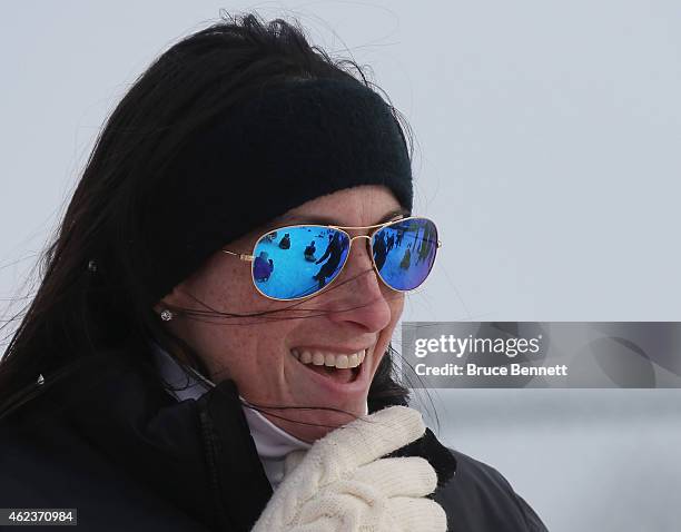 Woman watches her chidren as they sled at Mattlin Middle School on January 27, 2015 in Plainview, New York. The Long Island region received between...