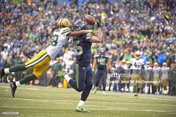 Playoffs: Seattle Seahawks Jermaine Kearse in action, making catch vs Green Bay Packers Tramon Williams at CenturyLink Field. Seattle, WA 1/18/2015...