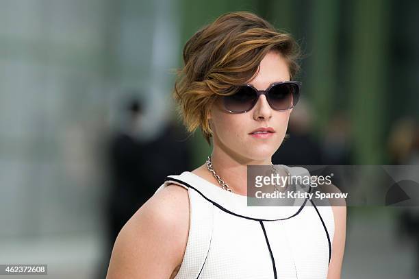 Kristen Stewart attends the Chanel show as part of Paris Fashion Week Haute Couture Spring/Summer 2015 at the Grand Palais on January 27, 2015 in...