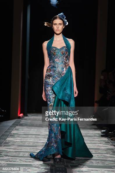 A model walks the runway during the Laurence Xu show as part of Paris ...