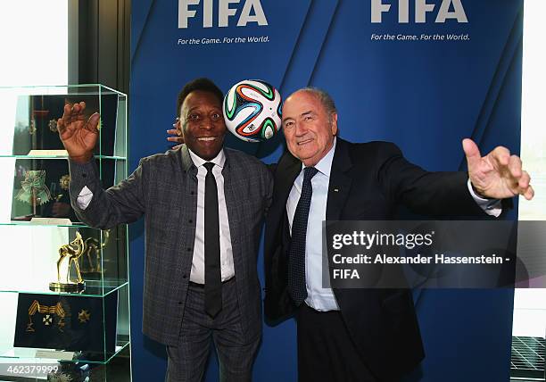 President Joseph S. Blatter poses with former Brazilian footballer Pele prior to the FIFA Ballon d'Or Gala 2013 at FIFA headquarters on January 13,...