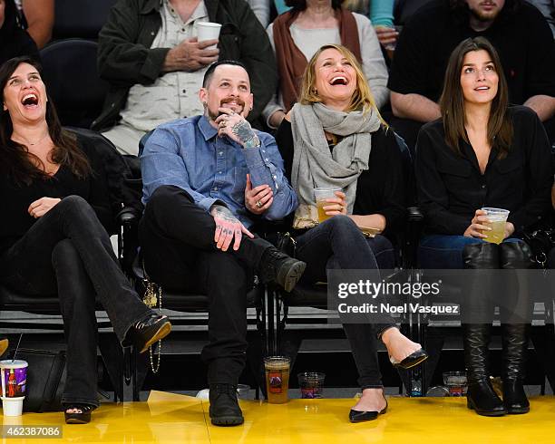 Benji Madden and Cameron Diaz attend a basketball game between the Washington Wizards and the Los Angeles Lakers at Staples Center on January 27,...