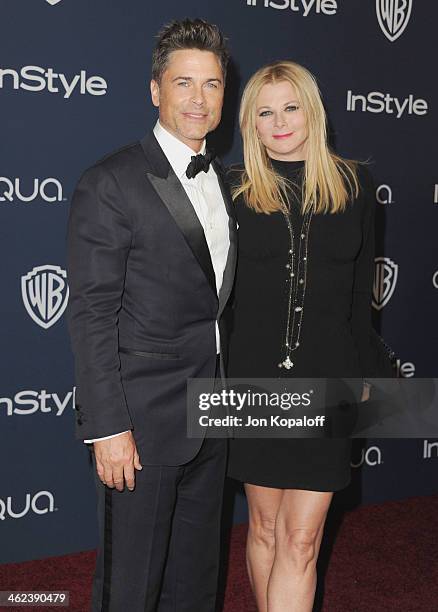 Actor Rob Lowe and wife Sheryl Berkoff arrive at the 2014 InStyle And Warner Bros. 71st Annual Golden Globe Awards Post-Party on January 12, 2014 in...