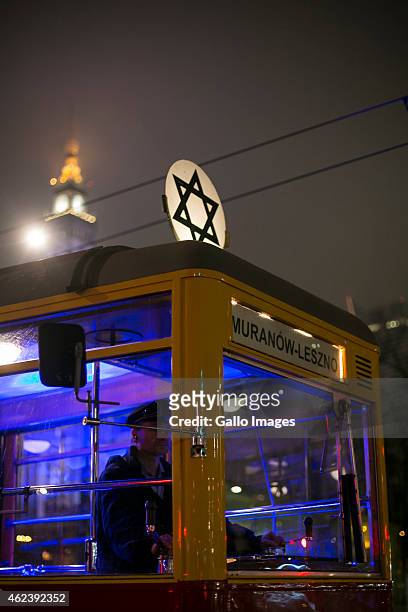An empty tram bearing the Star of David is taken through the streets on January 27, 2015 in honour of the International Day of Commemoration in...