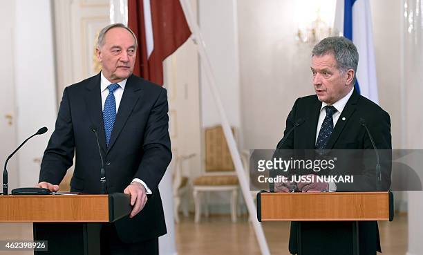 President of Latvia Andris Berzins and the President of Finland Sauli Niinistö give a press conference at the Presidential Palace in Helsinki,...