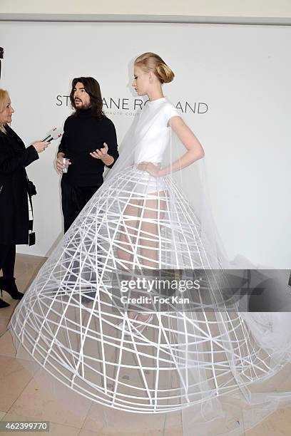 Stephane Rolland and the bride attend the Stephane Rolland Show as part of Paris Fashion Week Haute Couture Spring/Summer 2015 on January 27, 2015 in...