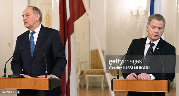Latvia's President Andris Berzins and his counterpart from Finland, Sauli Niinistö address a joint press conference at the Presidential Palace in...