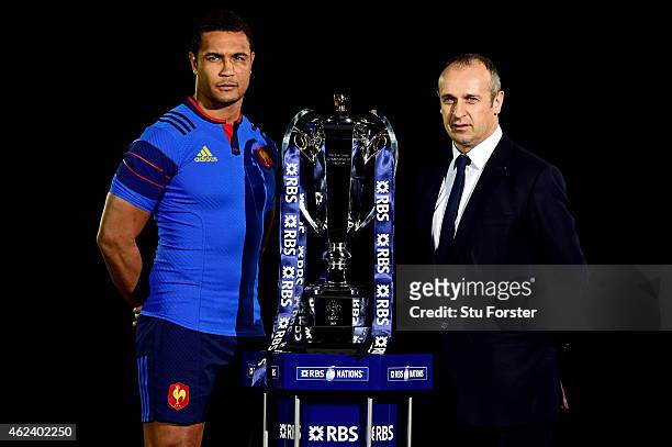 Thierry Dusautoir of France and Philippe Saint Andre pose with the trophy during the launch of the 2015 RBS Six Nations at the Hurlingham club on...