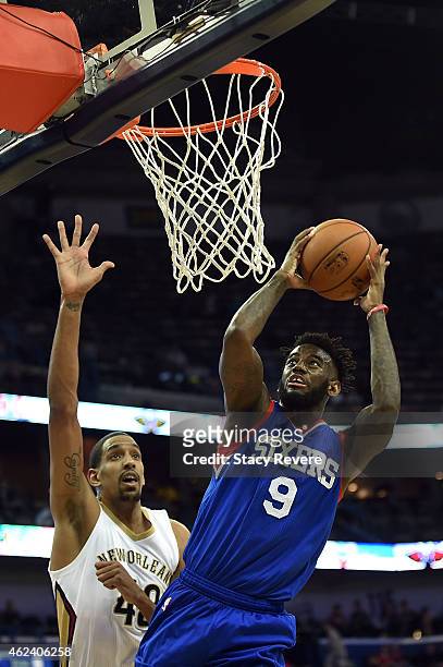 JaKarr Sampson of the Philadelphia 76ers takes a shot in front of Alexis Ajinca of the New Orleans Pelicans during the second half of a game at the...