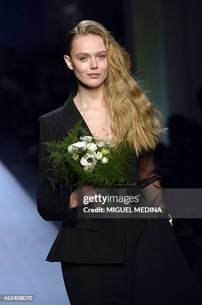 Swedish model Frida Gustavsson presents a creation by Jean Paul Gaultier during the 2015 Haute Couture Spring-Summer collection fashion show on...