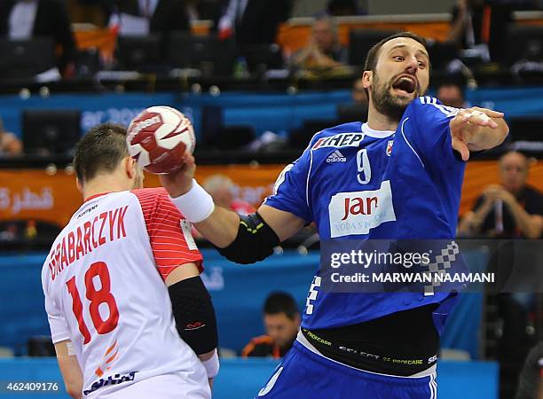 Croatia's Igor Vori attempts a shot on goal during the 24th Men's Handball World Championships quarterfinals match between Poland and Croatia at the...