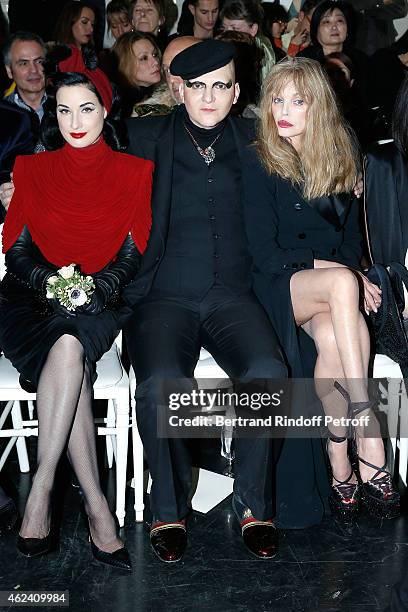 Dita Von Teese, Ali Mahdavi and Arielle Domasle attend the Jean Paul Gaultier show as part of Paris Fashion Week Haute Couture Spring/Summer 2015 on...